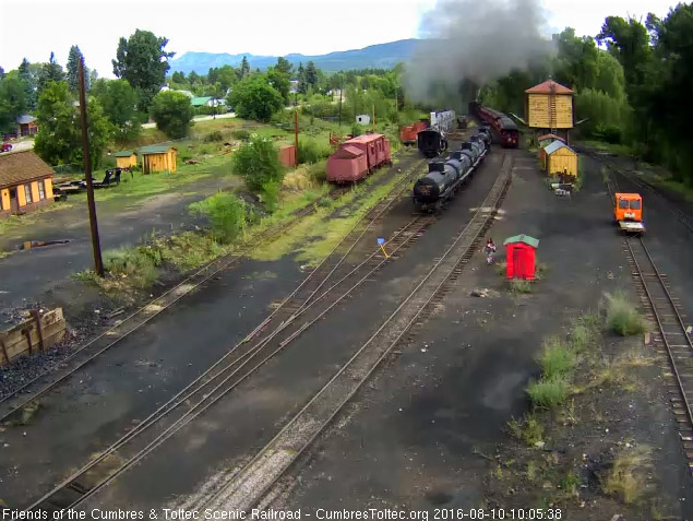 8.10.16 The locomotives are at the yard throat as Colorado passes the tank.jpg