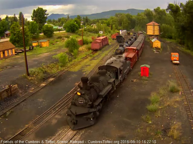 8.10.16 489 brings a 7 car plus caboose 215 into Chama.jpg