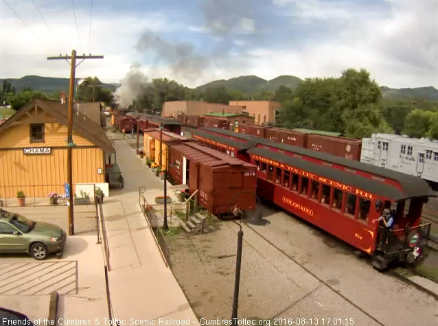 8.13.16 Ray is on the parlor platform signaling the engine.jpg