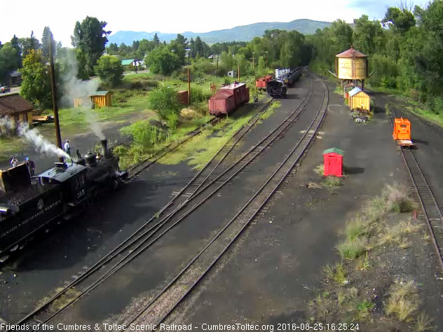 8.25.16 The sun is back out as the loader puts more coal into the 315's bunker.jpg