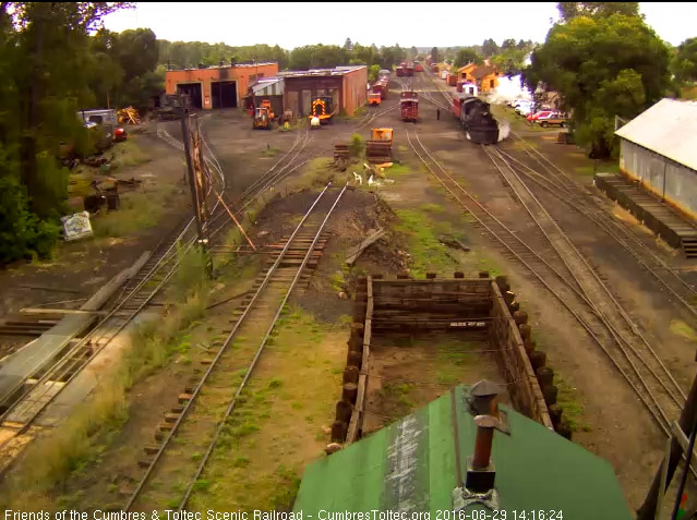 8.29.16 487 comes out of south yard with one of the standby coaches.jpg