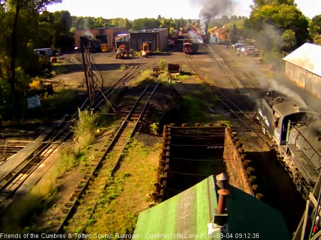 9.4.16 463 puts up quite a column of smoke as it moves the trainset into load position.jpg