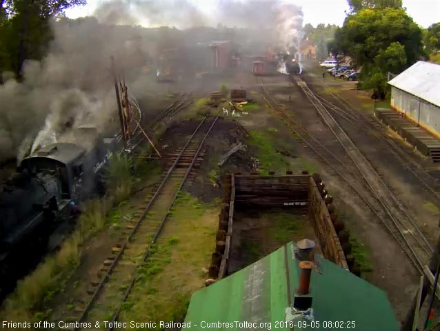 9.5.16 Through the haze off the 487 we see the 484 coming out of the yard.jpg