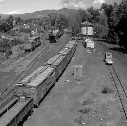 9.5.16 The freight from Durango takes water before climbing the hill.jpg