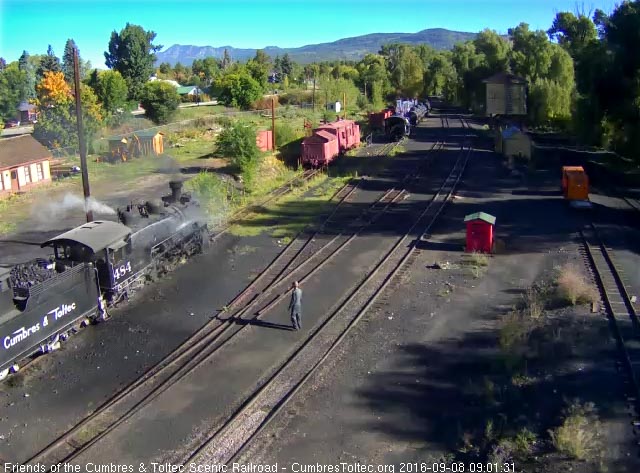 9.8.16 The hostler is standing on the ground as the road engineer washes off the 484.jpg