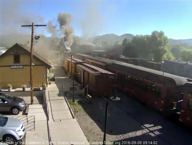 9.8.16 The 484 smokes up the depot area as it couples to 216.jpg