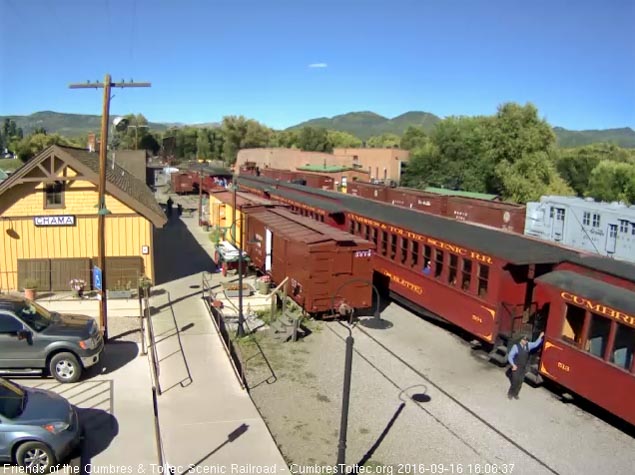 9.16.16 As the train comes to a stop the conductor drops off.jpg