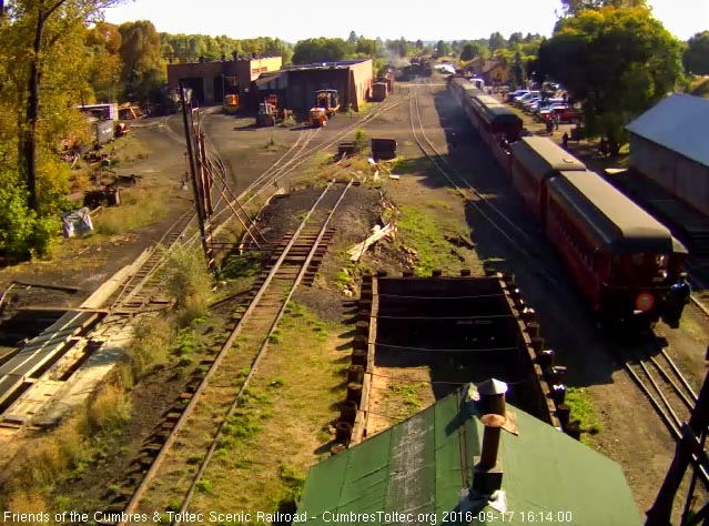 9.17.16 The trainman is on the steps of the New Mexico as it passes the tipple.jpg