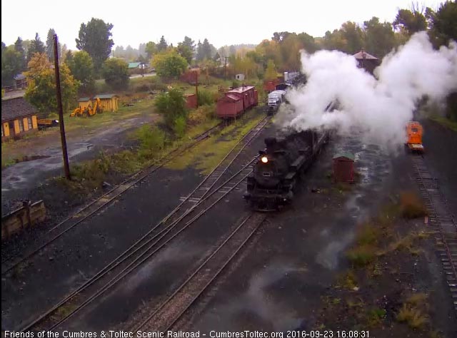 9.23.16 484 brings a 7 car 215 into a rain soaked Chama.jpg