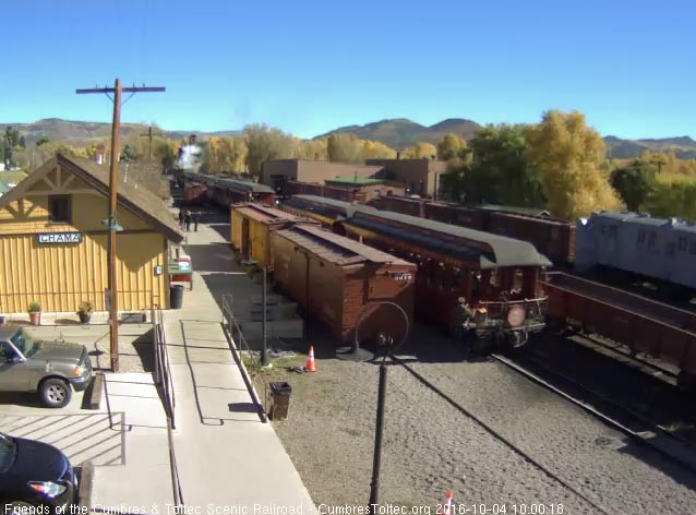 10.4.16 Conductor Ray climbs aboard the parlor as the train begins to move.jpg