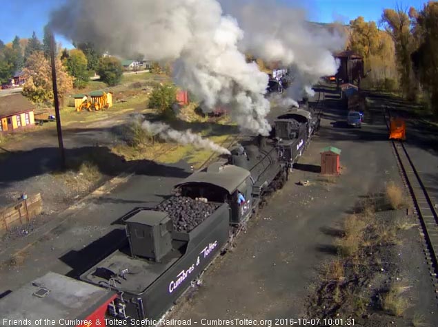 10.7.16 The 2 locomotives are looking good as they pass the tipple.jpg