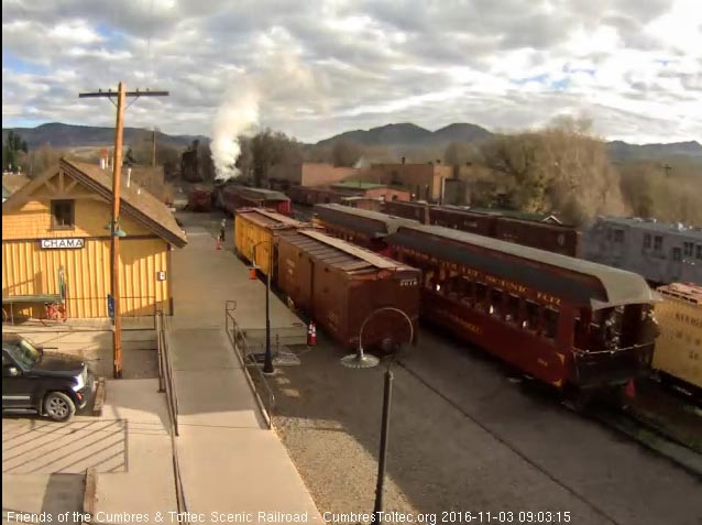 11.3.16 The New Mexico passes with the 2 train crewmen on the platform.jpg