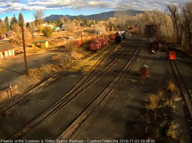 11.3.16 The last cars of the hospital train catch the sun as then head around the curve.jpg