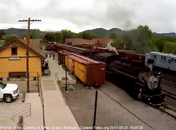 5-31-17 484 is slowing for the stop as it passes the depot.jpg