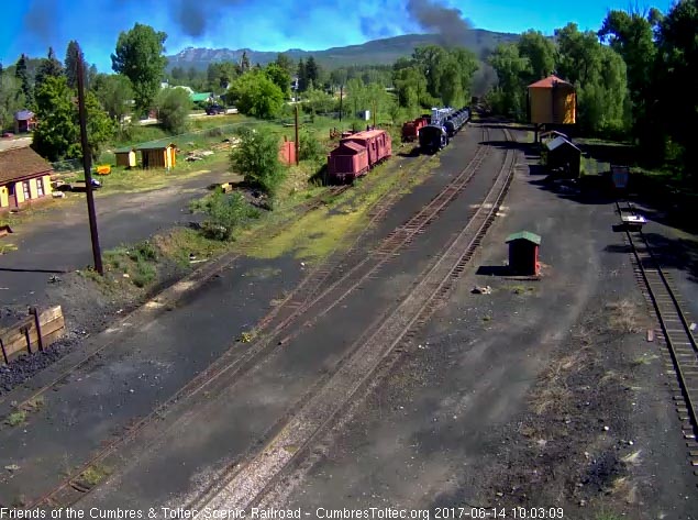 6-14-17 Train 216 is rounding the curve at the north end of the yard.jpg