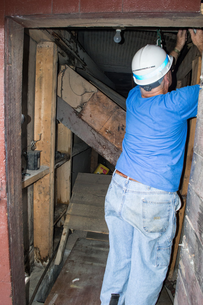 7-26-17 Barry Morris installs the comealong support for moving the air tank into place.jpg