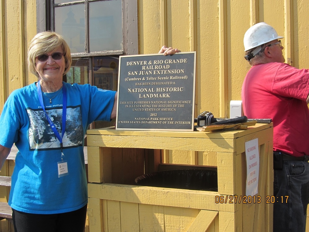 Photo 6-27-13 Placing NHL Award on Chama Depot.JPG