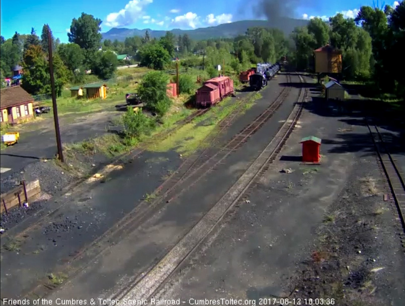 8-12-17 The last cars of the train round the curve as it heads east.jpg