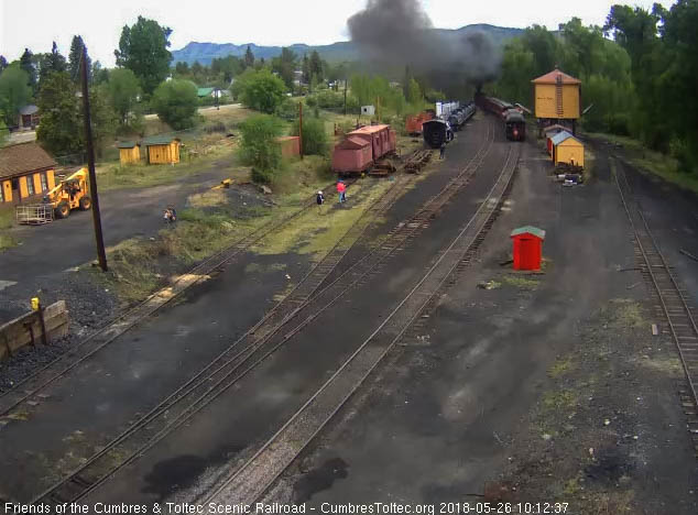 2018-05-26 The locomotives are leaving the yard as the parlor is passing the tank.jpg