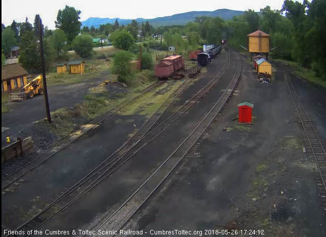 2018-05-26 The headlight of 463 shines out as it rounds the curve north of the yard (1 of 1).jpg