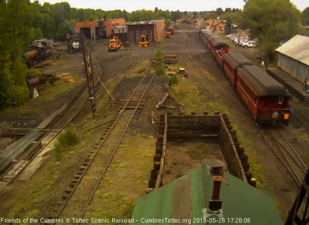 2018-05-26 The trainman is on the steps of the parlor Colorado.jpg