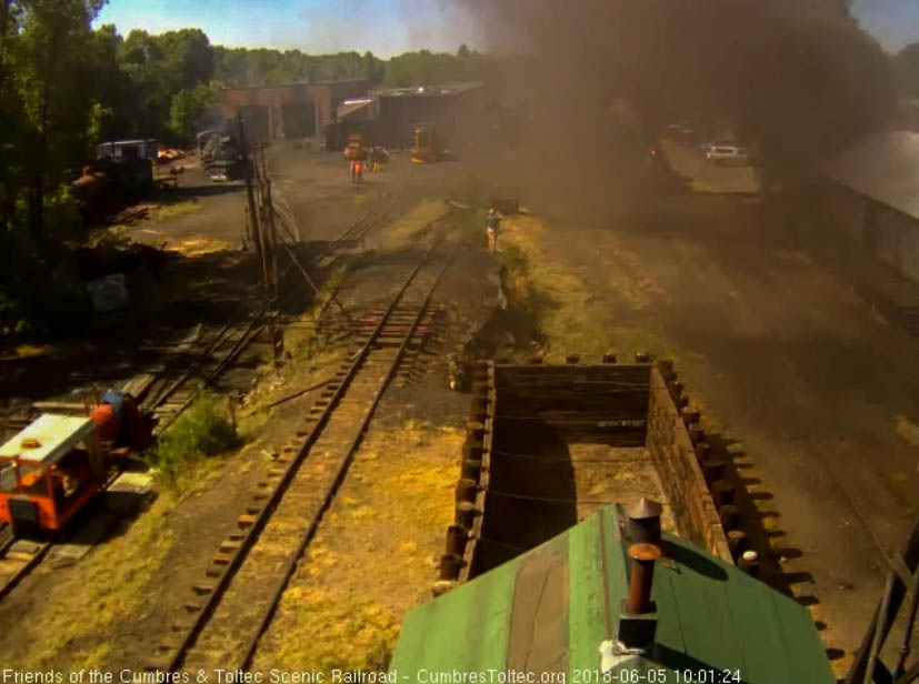 2018-06-05 Behind a screen of coal smoke and steam, 488 gets its train underway.jpg