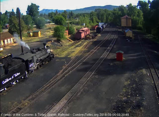 2018-06-06 Coal dust billows as the loader dump a scoop into the half empty bunker.jpg