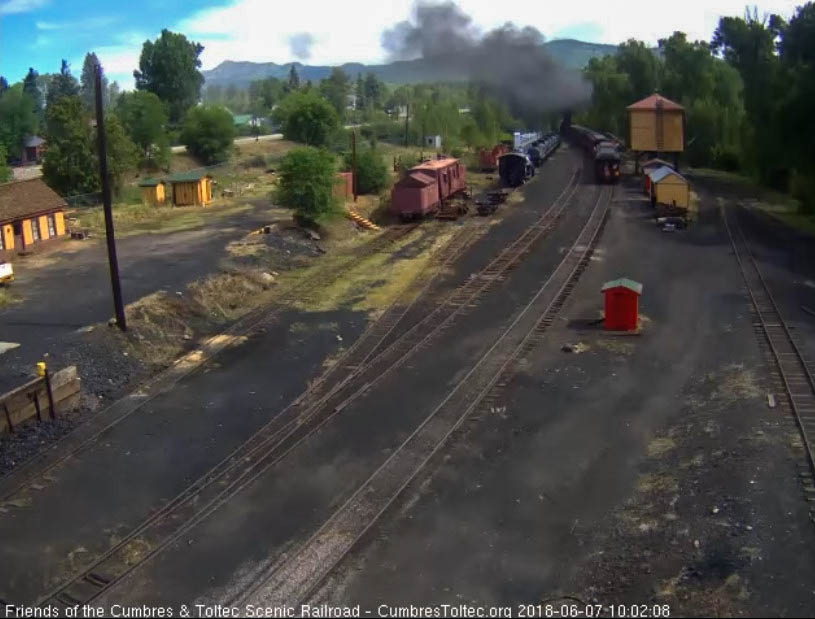 2018-06-07 The parlor New Mexico is passint the tank as the locomotives are leaving the yard.jpg