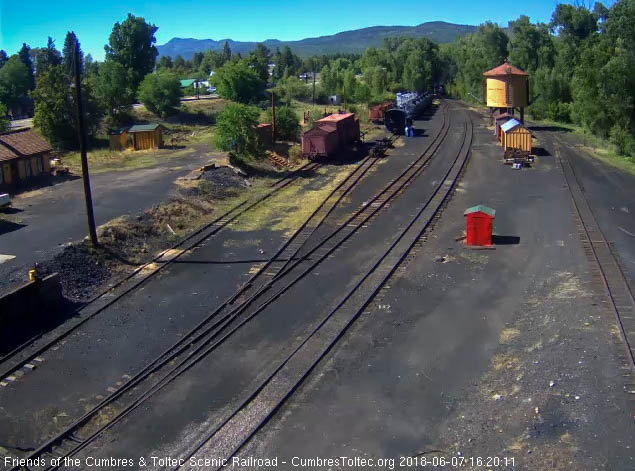 2018-06-07 The 487 brings its 8 car train 215 into Chama.jpg