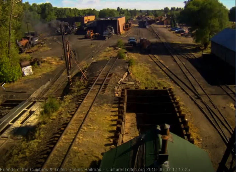 2018-06-07 The 487 shoves the consist into the yard track closest to the main.jpg