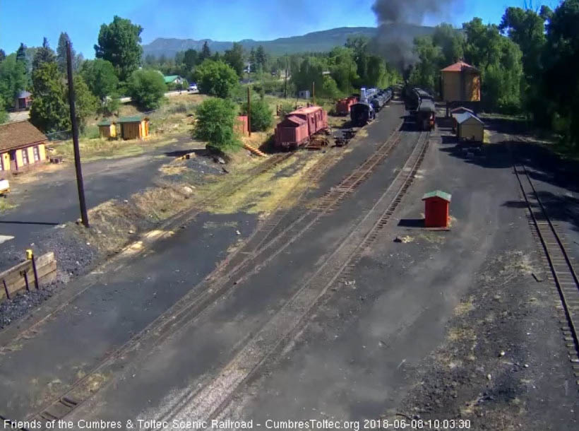 2018-06-08 The parlor Colorado passes the tank as 487 is clearing north yard.jpg