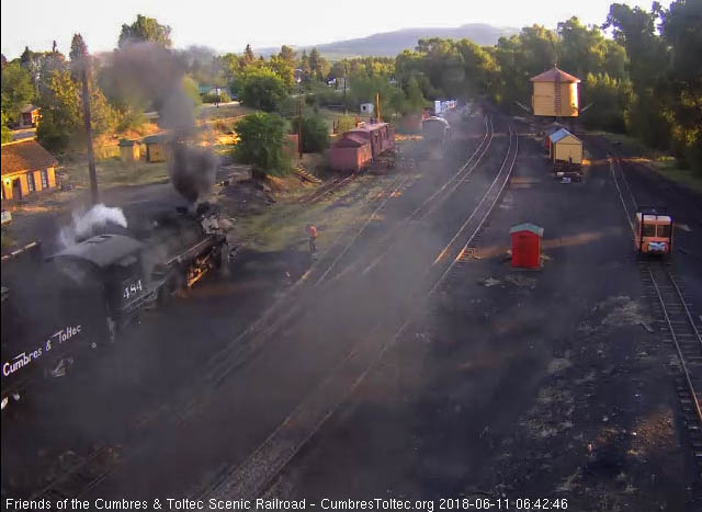 2018-06-11 The 484 is bathed in its own steam and smoke as coal is added.jpg