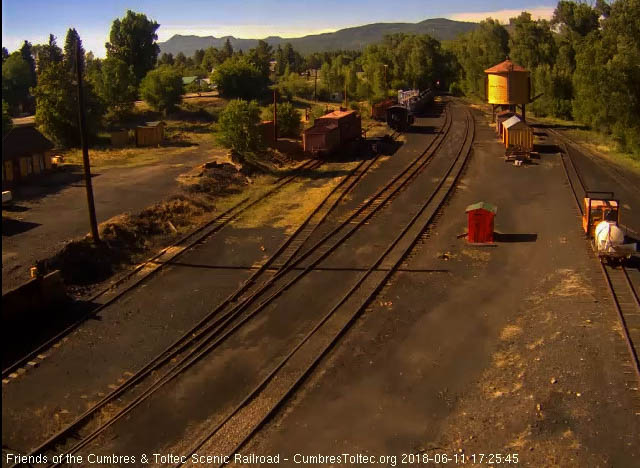 2018-06-11 The headlight of 489 shines out as the student freight enters Chama.jpg