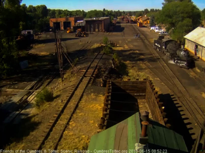 2018-06-15 The 487 pulls by the woodshop as it heads to get coal.jpg