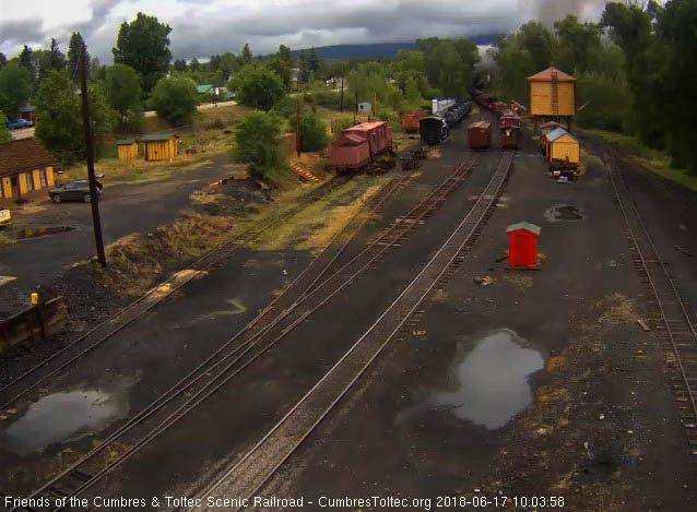 2018-06-17 The caboose is passing the tank as the 487 blows for the Chama River bridge.jpg