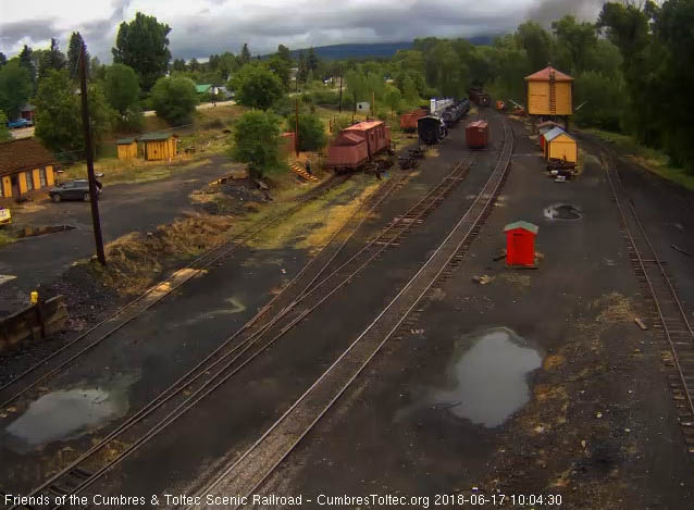 2018-06-17 The caboose is clearing Chama yard as the 2 fire patrol speeders are waiting to follow.jpg