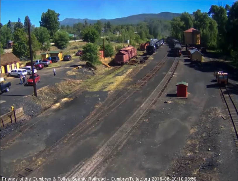 2018-06-20 The 484 is almost out of the yard as the parlor passes the tank.jpg