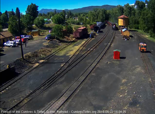 2018-06-21 The 484 is up to the tank as the following speeder's light is seen behind the train.jpg