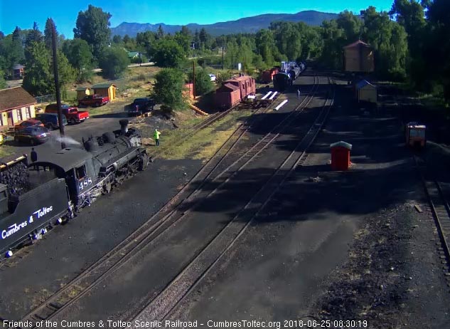 2018-06-25 The loader dumps a bucket of coal into the tender as the dust rises.jpg