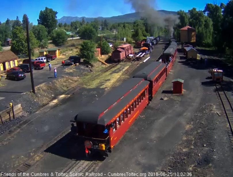 2018-06-25 The parlor New Mexico is seen and the conductor is looking at his train.jpg