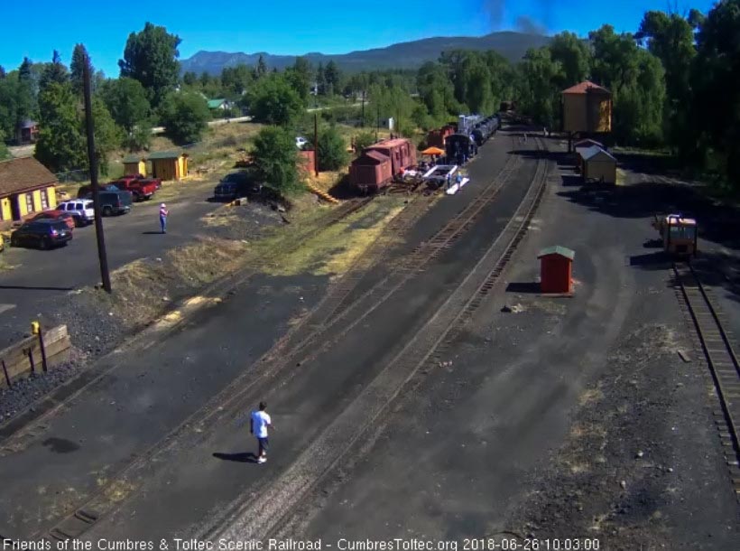 2018-06-26 The last cars are into the curve as the train heads east.jpg