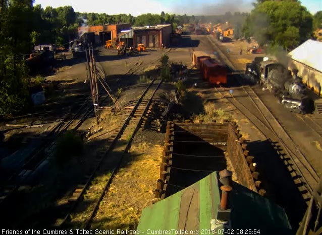 2018-07-02 The 487 pulls past the woodshop as it moves to the coal dock.jpg