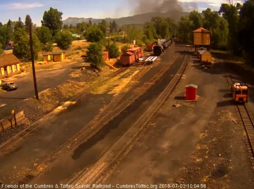 2018-07-03 The last cars are rounding the curve as the 2 speeders get onto the main.jpg