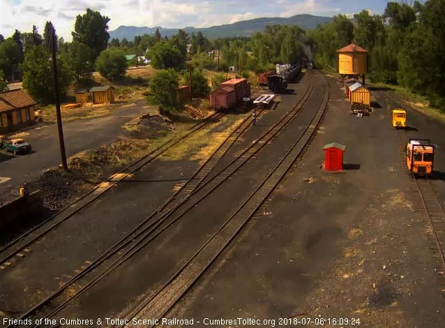 2018-07-06 The 487 brings a 9 car train 215 into Chama.jpg