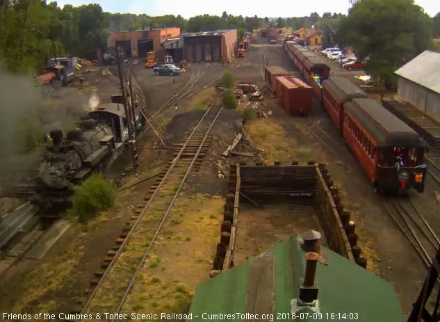 2018-07-09 The parlor Colorado is on the markers as we see the car host and trainman talking.jpg