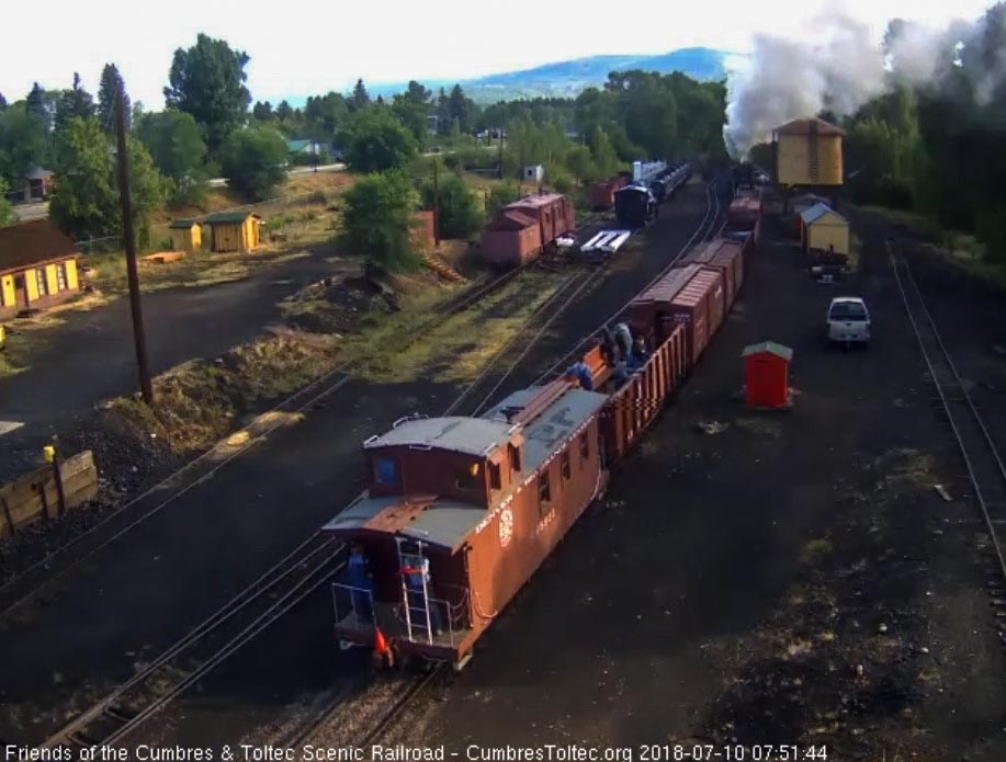 2018-07-10 The conductor and trainman are on the back platform of the caboose.jpg