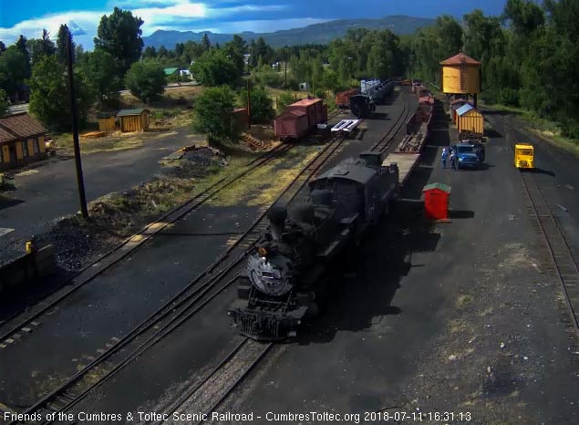 2018-07-11 As the 484 comes  up to the tipple we can see that they added some cars in Antonito.jpg
