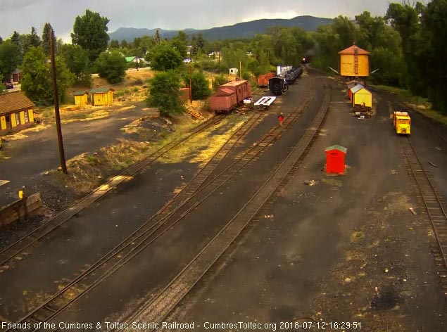 2018-07-12 The 487 brings an 8 car train 215 into Chama.jpg