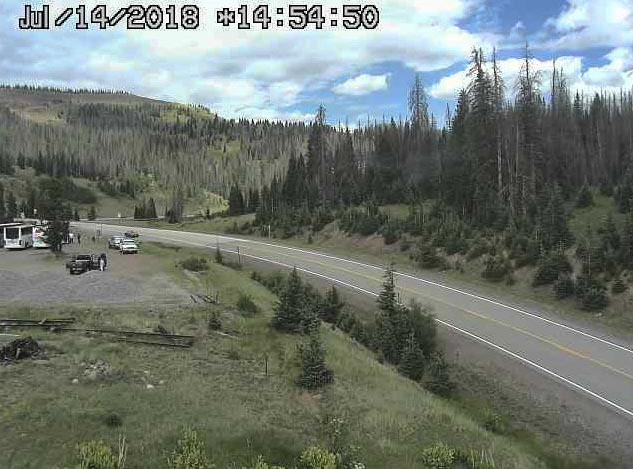 2018-07-14 Train 215 has arrived at Cumbres, you can just see the top of the parlor over the buses.jpg