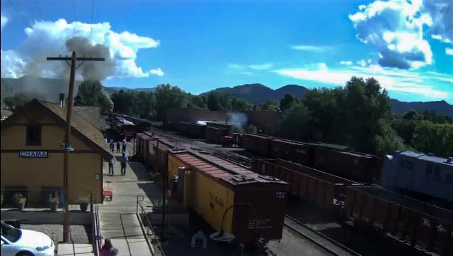 2018-07-15 The fire truck is moving to cross over the yard as the train recedes_.jpg